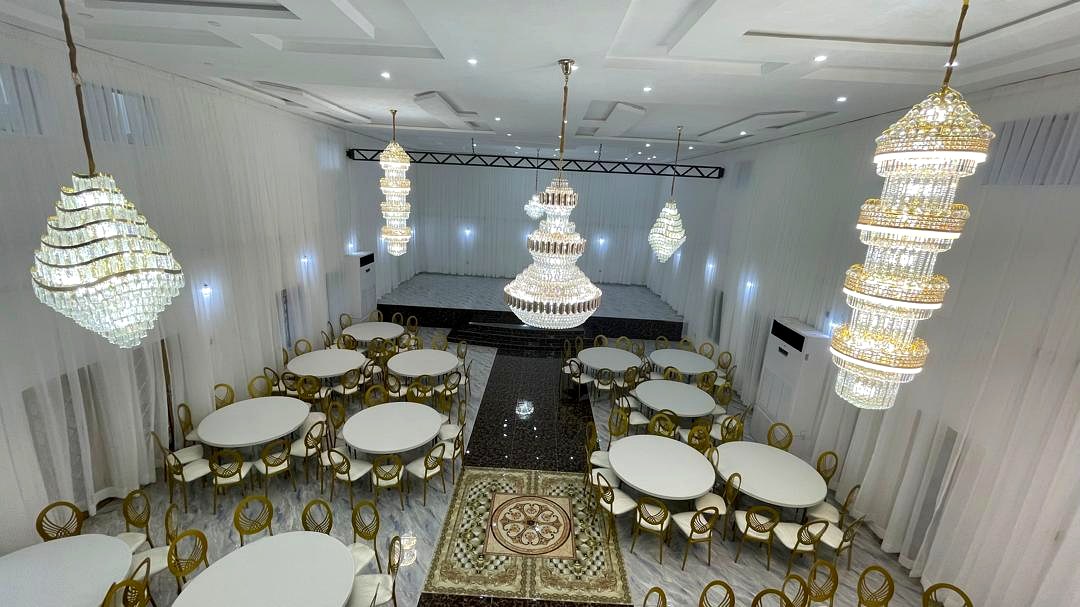 Round table settings and gold seating